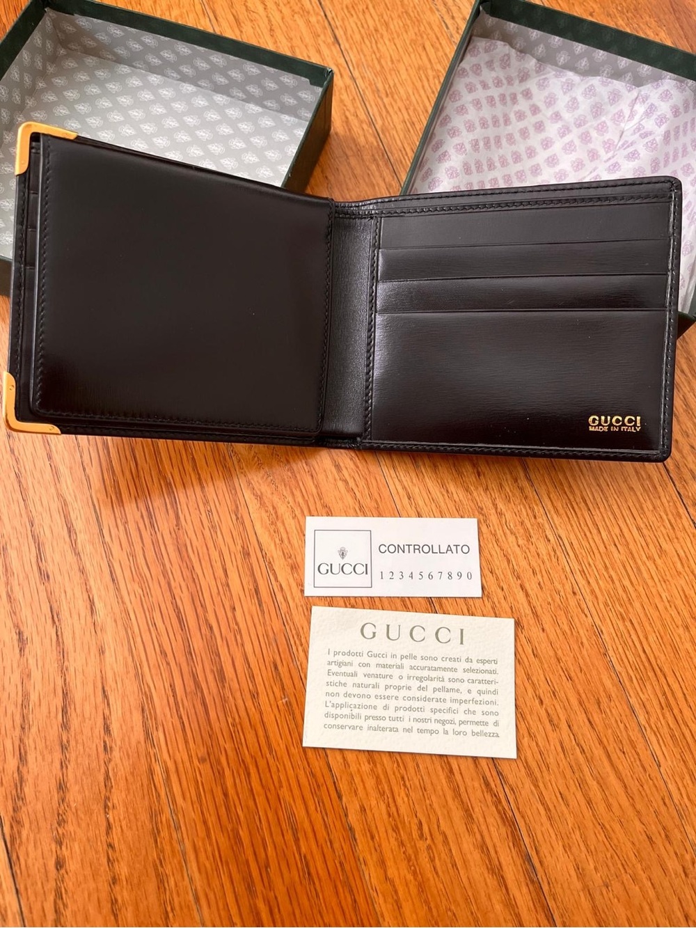 Gucci Black Leather Bifold Wallet with Gold Logo